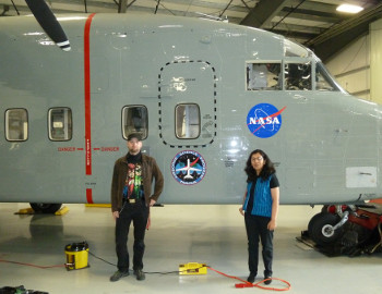Prakash and Buchhorn in front of NASAs C-23 Sherpa aircraft