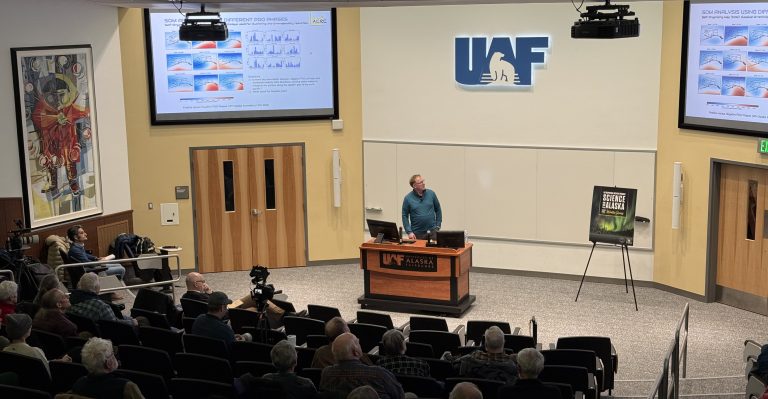 A picture of a research giving a Science for Alaska talk